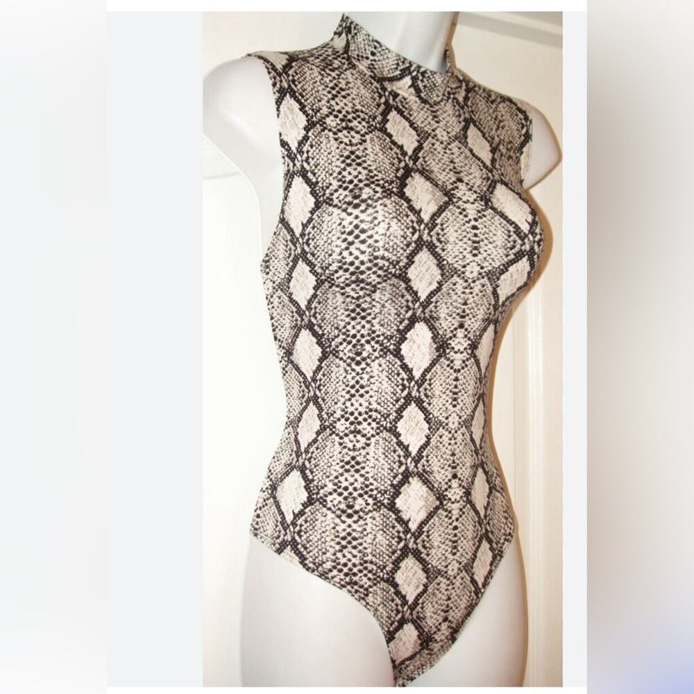 CAUTION TO THE WIND ANIMAL PRINT BODYSUIT SIZE M
